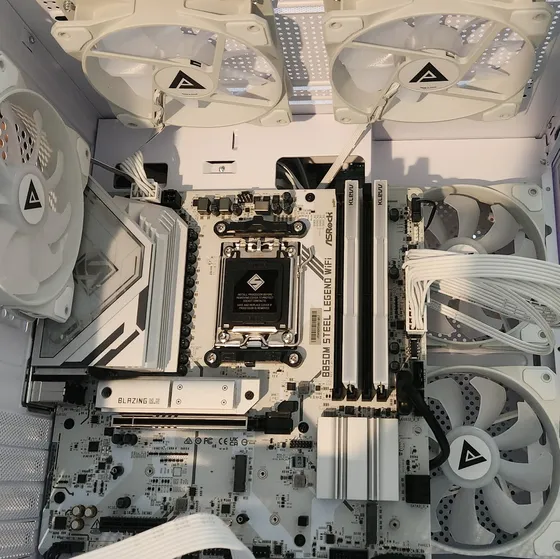 Computer repair technician inspecting a desktop PC